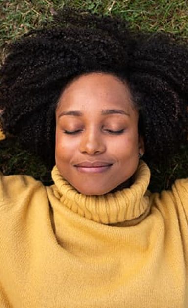 young-african-american-woman-rest-lying-on-grass-w-2021-12-09-21-17-52-utc-1.jpg