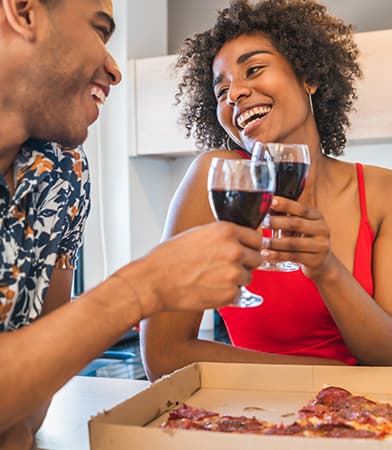 portrait-happy-young-latin-couple-enjoying-having-dinner-new-home-lifestyle-relationship-concept (1)