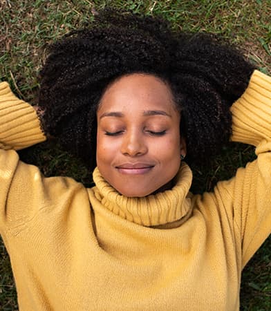 young-african-american-woman-rest-lying-on-grass-w-2021-12-09-21-17-52-utc-1.jpg