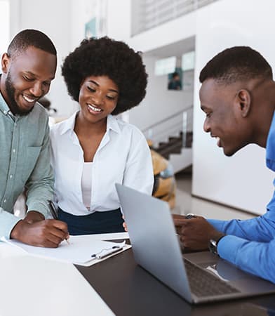 young-black-couple-buying-new-auto-signing-car-pu-2021-09-04-10-23-07-utc (1)